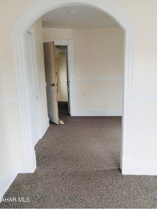 spare room with carpet flooring