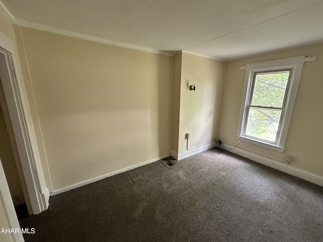 2013 7th Ave, Altoona, PA 16602 - spare room with dark carpet and ornamental molding