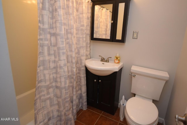 full bathroom featuring tile patterned flooring, vanity, toilet, and shower / bath combo