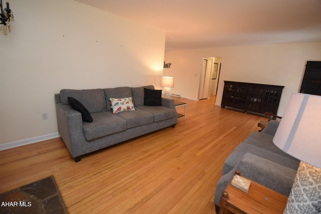 living room with hardwood / wood-style flooring