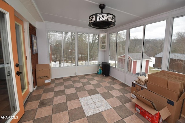 view of unfurnished sunroom