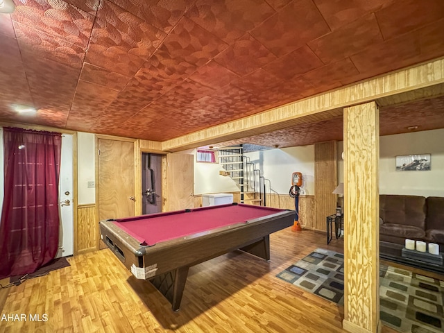 recreation room featuring hardwood / wood-style floors, billiards, and wood walls