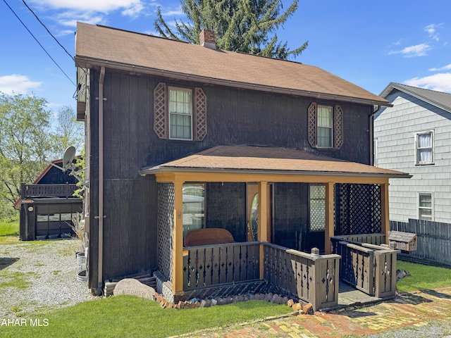 view of front of property featuring covered porch