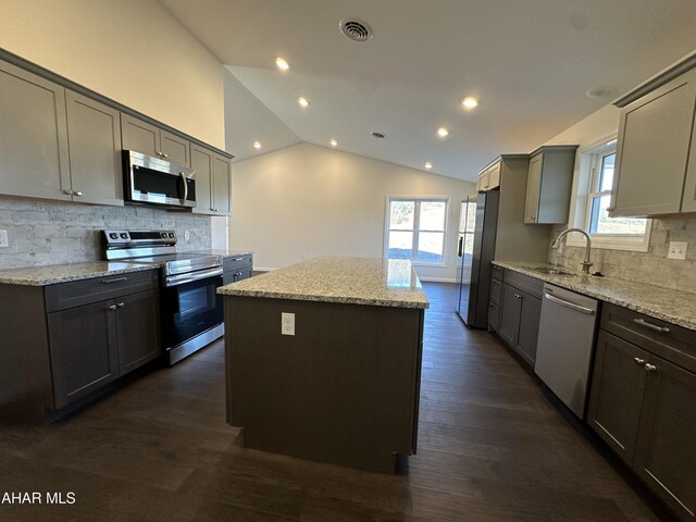 spare room featuring dark hardwood / wood-style flooring