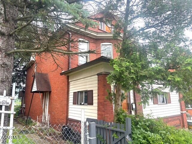 600 N 6th Ave, Altoona, PA 16601 - view of property exterior with brick siding