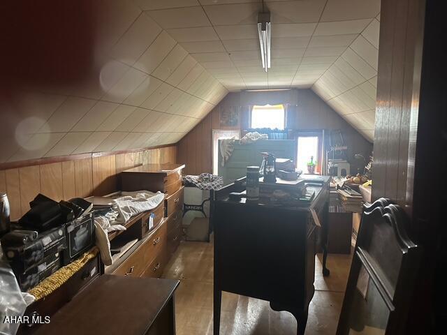 600 N 6th Ave, Altoona, PA 16601 - bedroom with lofted ceiling and wood walls