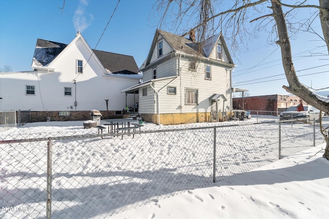 view of snow covered property