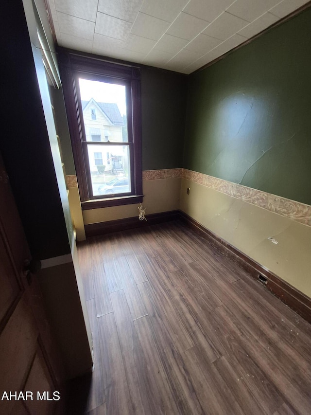1302 3rd Ave, Altoona, PA 16602 - spare room with wood finished floors and baseboards