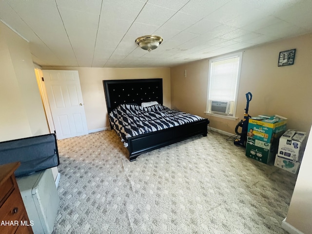 bedroom with carpet and cooling unit