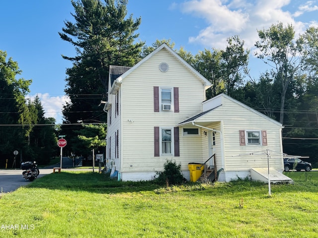 front of property with a front yard