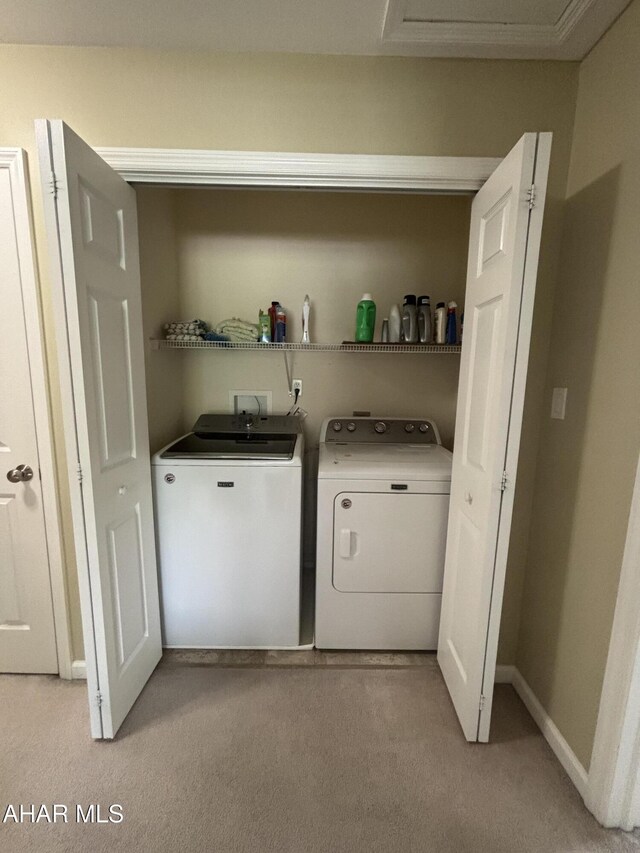 215 Red Fox Dr, Duncansville, PA 16635 - laundry area with light carpet, washer and dryer, and baseboards
