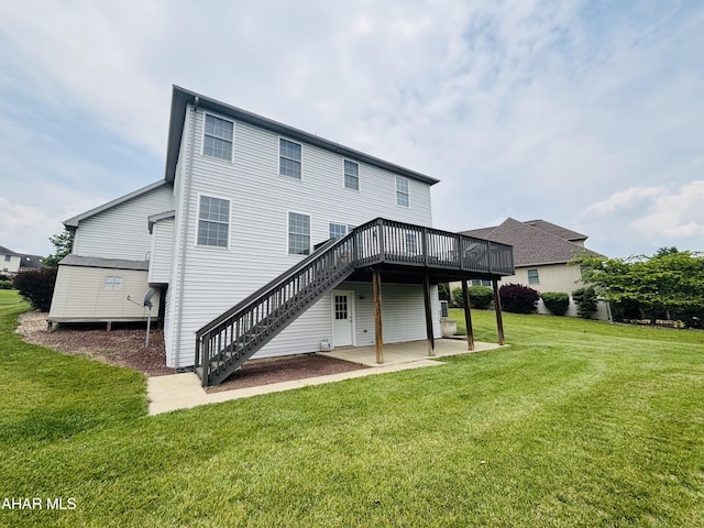 215 Red Fox Dr, Duncansville, PA 16635 - rear view of house with stairs, a patio area, a wooden deck, and a yard