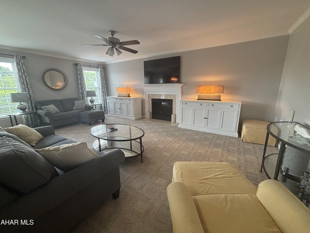 215 Red Fox Dr, Duncansville, PA 16635 - living area featuring crown molding, light carpet, a ceiling fan, and a fireplace with flush hearth