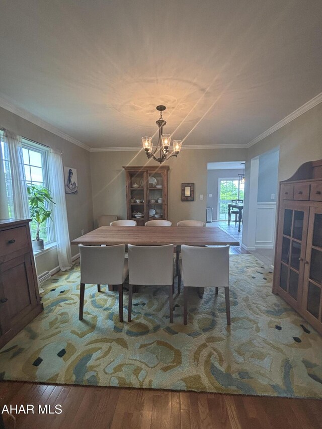 215 Red Fox Dr, Duncansville, PA 16635 - dining area featuring a chandelier, ornamental molding, and light wood-type flooring