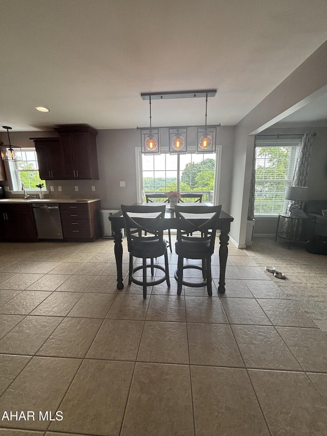 215 Red Fox Dr, Duncansville, PA 16635 - dining room featuring track lighting, tile patterned floors, and baseboards