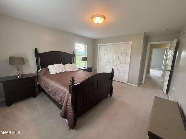 215 Red Fox Dr, Duncansville, PA 16635 - bedroom featuring light carpet, a closet, and baseboards
