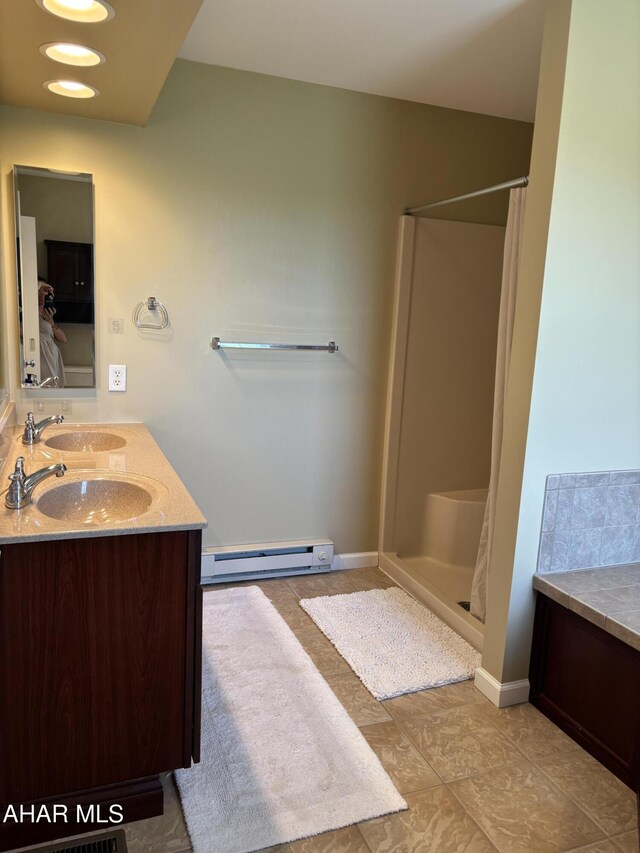 215 Red Fox Dr, Duncansville, PA 16635 - bathroom featuring a baseboard radiator, double vanity, a shower with shower curtain, and tile patterned floors