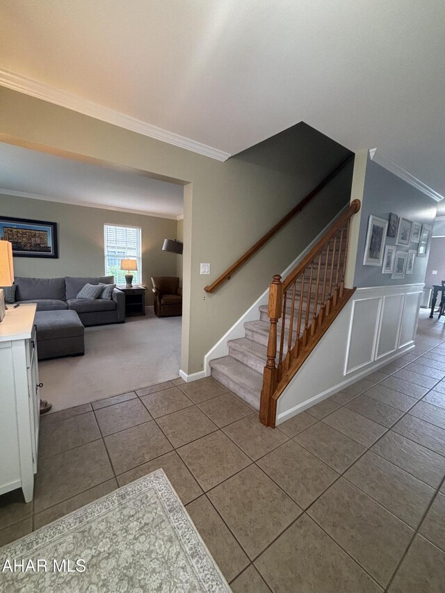 215 Red Fox Dr, Duncansville, PA 16635 - stairway with crown molding, tile patterned floors, carpet flooring, and baseboards