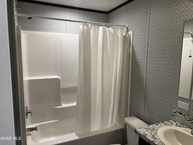 full bathroom with vanity, toilet, and shower / bath combo with shower curtain