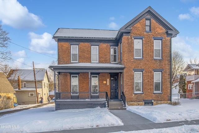 front of property featuring covered porch