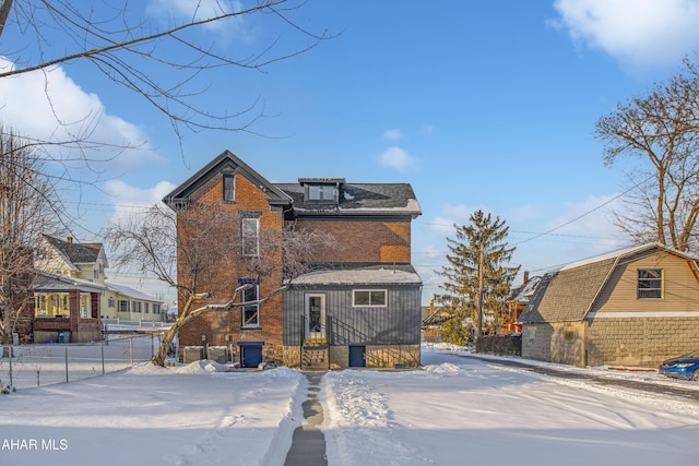 view of snow covered property