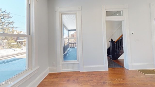 interior space with hardwood / wood-style floors