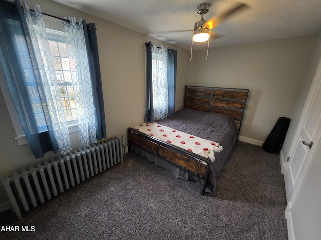bedroom with radiator, baseboards, a ceiling fan, and carpet floors