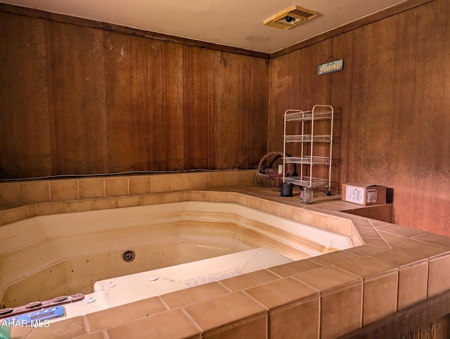 225 Mickel Ln, Duncansville, PA 16635 - bathroom with wood walls and a tub with jets