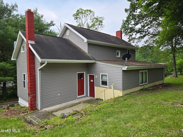 225 Mickel Ln, Duncansville, PA 16635 - view of front of house featuring a chimney and a front lawn