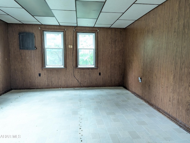 225 Mickel Ln, Duncansville, PA 16635 - empty room with a drop ceiling and wood walls