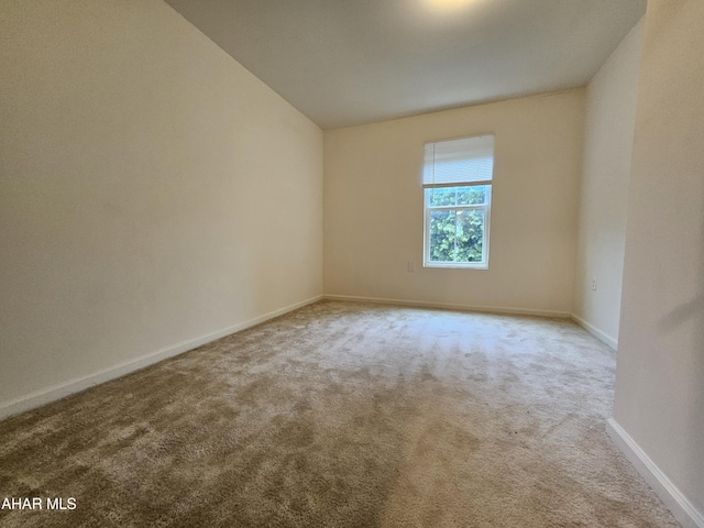 413 10th St, Altoona, PA 16602 - spare room featuring carpet flooring and baseboards