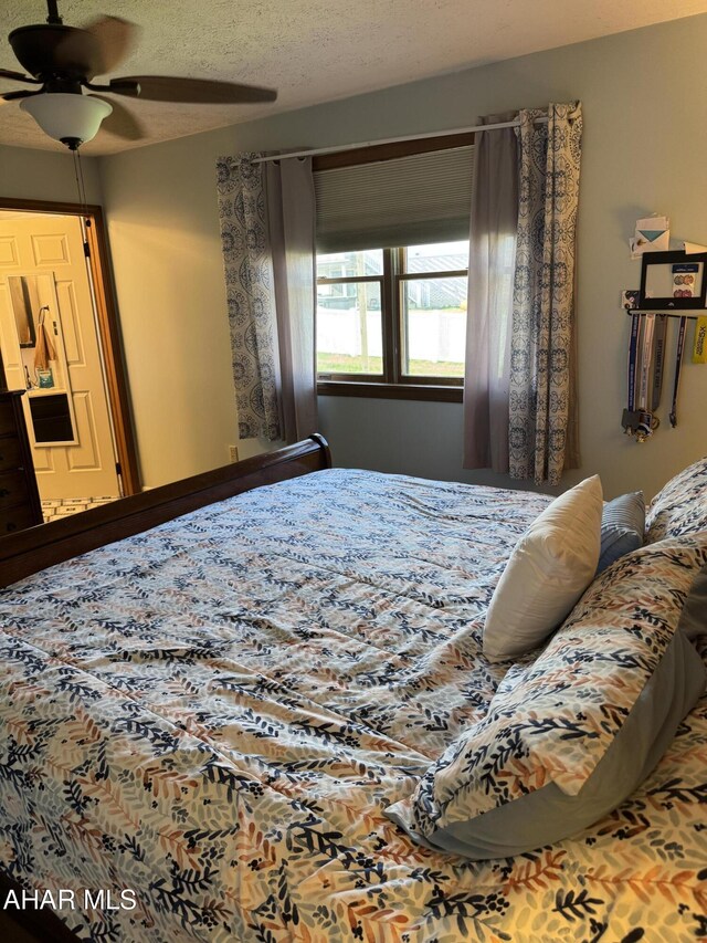 bedroom featuring ceiling fan
