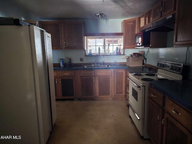4924 Colonel Drake Hwy, Ashville, PA 16613 - kitchen with under cabinet range hood, a sink, dark countertops, and white appliances