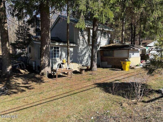 4924 Colonel Drake Hwy, Ashville, PA 16613 - rear view of property with a lawn