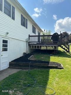 1012 Gray Ln, Duncansville, PA 16635 - rear view of house featuring a wooden deck, stairway, and a yard