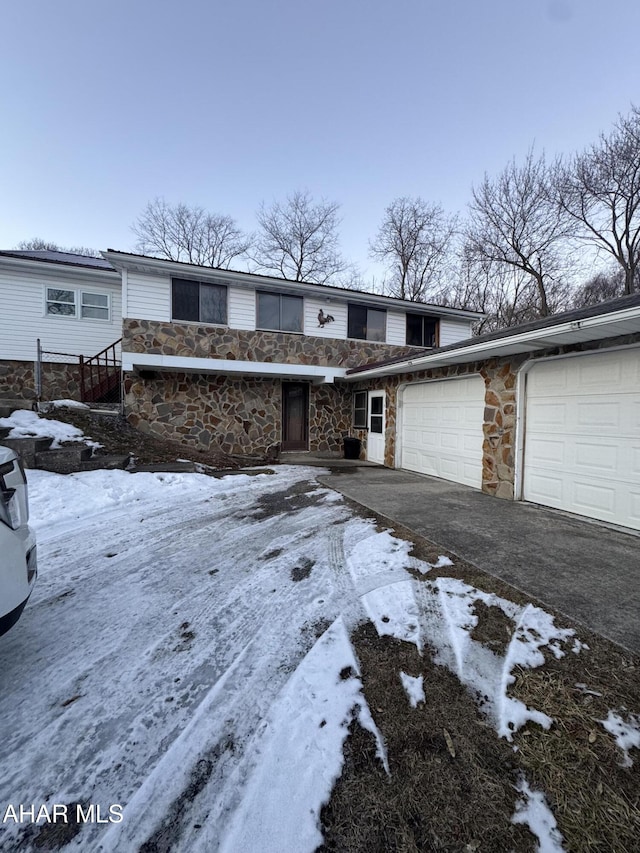 view of front of property with a garage