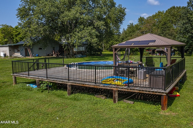 view of pool featuring a gazebo and a yard