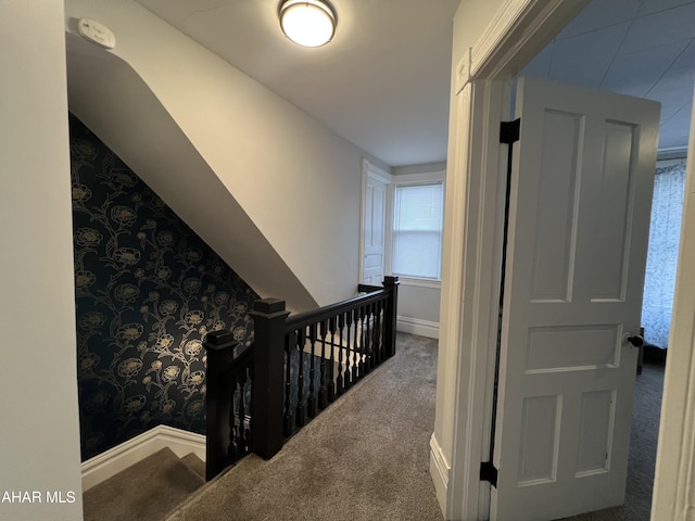 corridor featuring carpet flooring