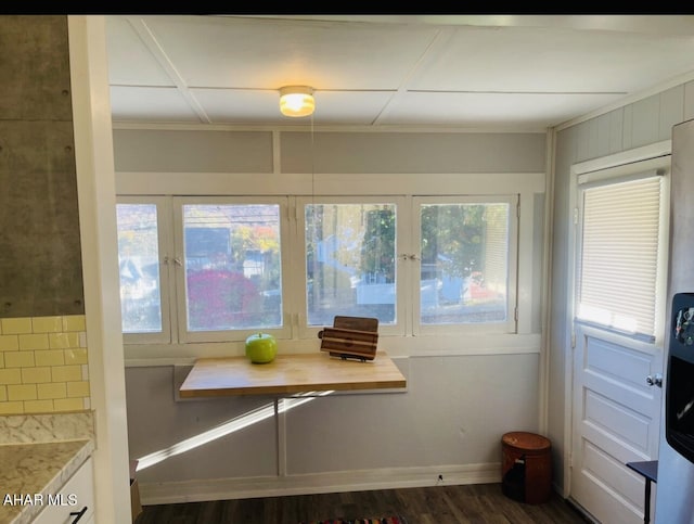 unfurnished sunroom with plenty of natural light and breakfast area