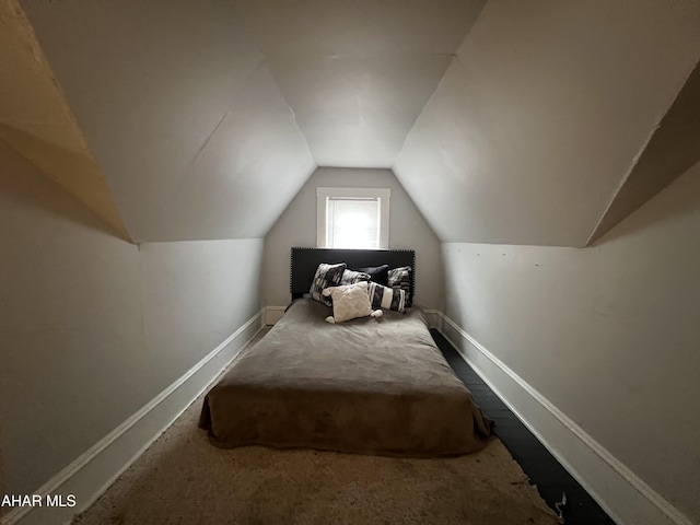 bedroom with vaulted ceiling