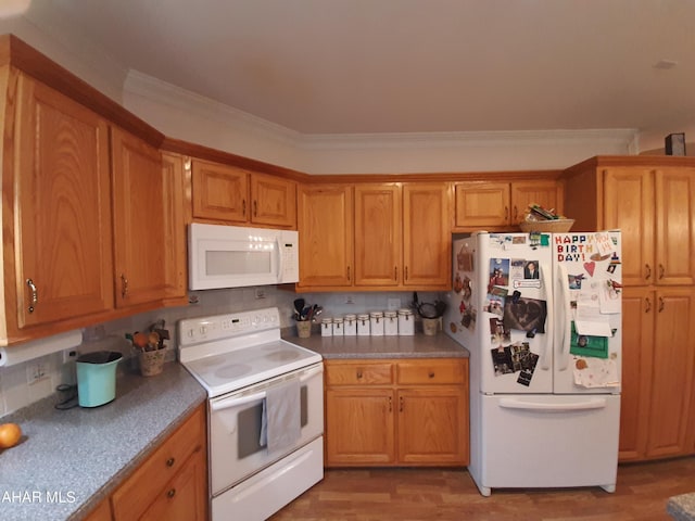 kitchen featuring decorative backsplash, crown molding, white appliances, and light wood-type flooring