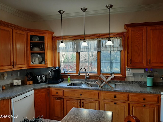 kitchen with tasteful backsplash, ornamental molding, white dishwasher, sink, and pendant lighting