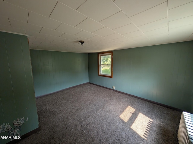 empty room with carpet flooring