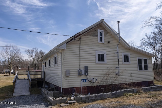 view of home's exterior with a deck