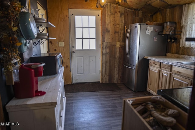 kitchen featuring open shelves, dark wood-style flooring, light countertops, wood walls, and appliances with stainless steel finishes