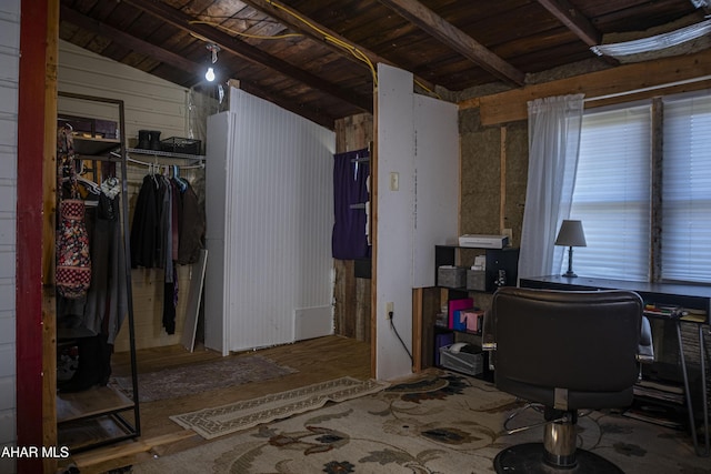 office space with wood ceiling and vaulted ceiling with beams