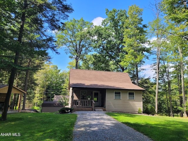 view of front of house featuring a porch and a front yard