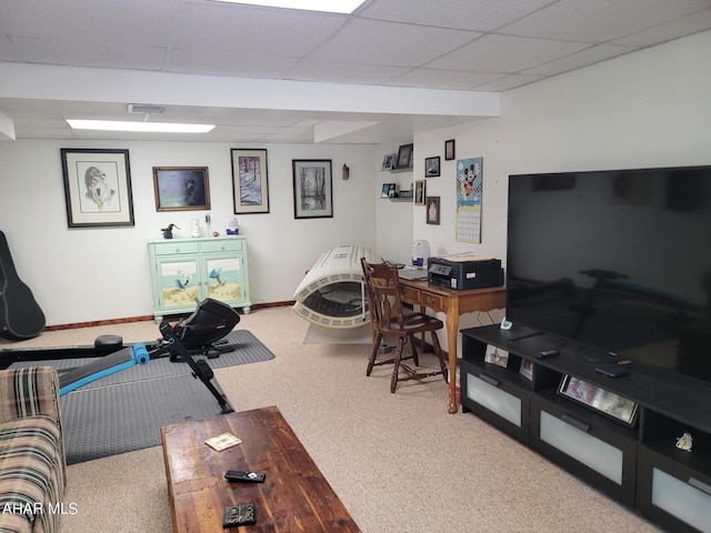 interior space with a drop ceiling, carpet flooring, visible vents, and baseboards