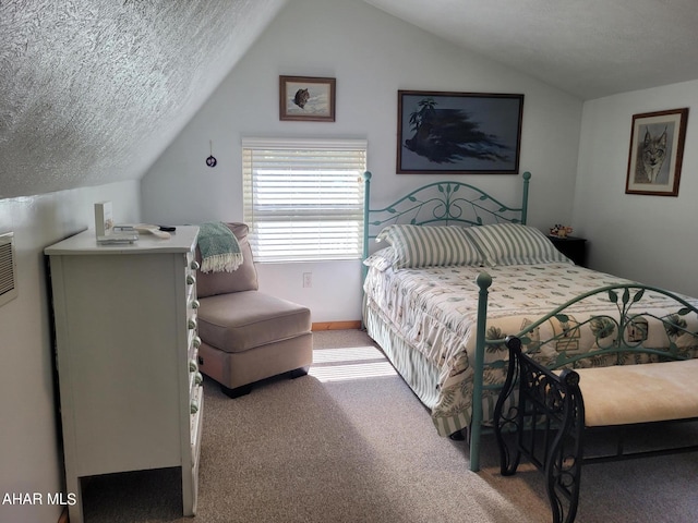 bedroom featuring a textured ceiling, vaulted ceiling, and light colored carpet