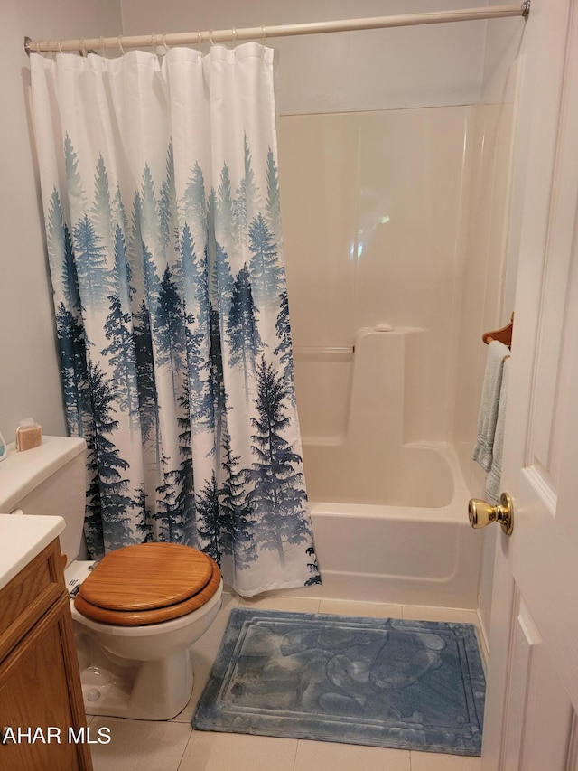 bathroom with toilet, tile patterned flooring, shower / bathtub combination with curtain, and vanity